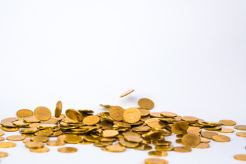 Movement of falling gold coin, flying coin, rain money with soft shadow on white background, business and financial wealth and take profit concept.