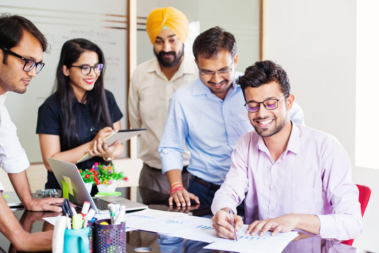 Indian business team discussing a project