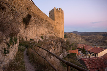The walls of Morella in els ports during sunset