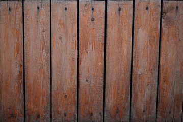 Wooden planks and logs.Wood texture. Wood texture. Wooden wall.Old wood. The color of the wood.Painted boards.