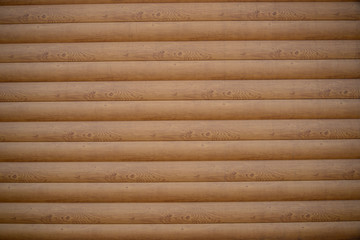 Wooden planks and logs.Wood texture. Wood texture. Wooden wall.Old wood. The color of the wood.Painted boards.