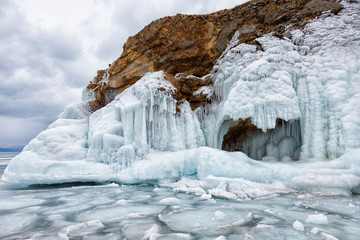 Rocks covered with ice on Lake Baikal in winter