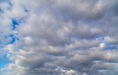 Obraz premium Clouds against the blue sky as a background