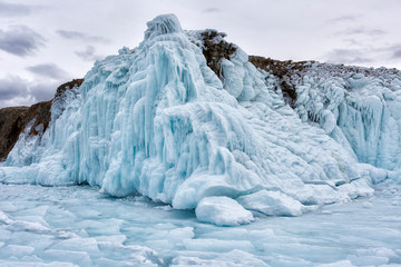 Rocks covered with ice on Lake Baikal in winter
