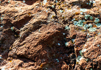 Stone rock in the mountains as a background