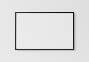 Black rectangular horizontal frame hanging on a white wall mockup 3D rendering