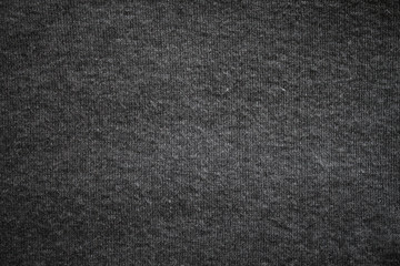 dark grey background. abstract texture of fleecy knitted fabric.