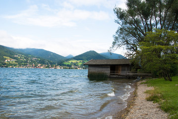 Fototapeta na wymiar View of a Boat House at Lake Tegernsee in Germany on a Summer Day