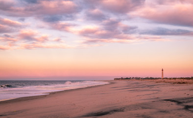 Fototapeta na wymiar Cape May, NJ, lighthouse on beautiful calming sunrise on an early spring morning