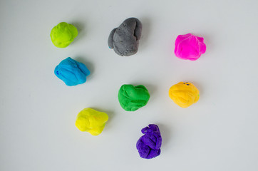 kid play with plastiline. Child's hands with plastiline. Colorful clay