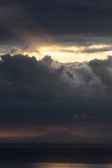 Dramatic sunrise over the  Los Angeles skyline with light rays