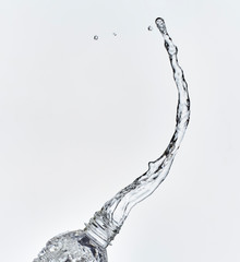 splash water coming out of the bottle