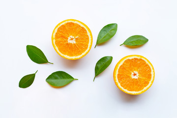 Fresh orange citrus fruits with leaves on white