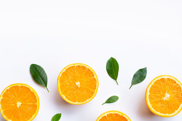 Top view of orange fruits and leaves isolated on white background.