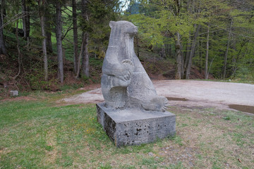 Bear sculpture near Schleching city, Germany