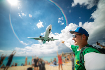 Perfect selfie with beach and airplane on background. Maho beach. Traveling concept