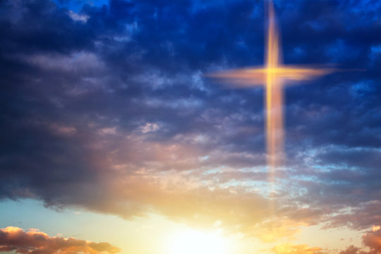 Religion symbol shape .  Dramatic nature background  , Glowing cross in sky . Happy Easter. Light from sky . Religion background .  Paradise heaven . Light in sky .