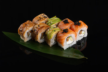 assorti set sushi roll on banana leaf