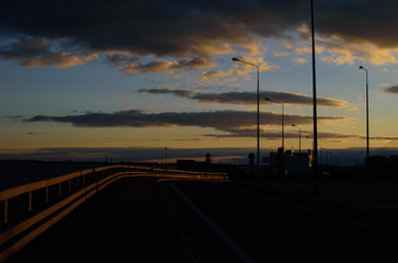 Fototapeta na wymiar Sunset on the highway.
