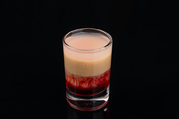 the B-52 cocktail shot on black background