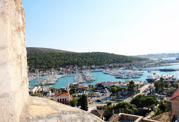 View of the city from the old Ottoman Cesme Castle. View of the Cesme marina