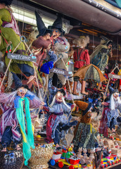 Naklejka premium The souvenir traditional czech witches for sale at gift store