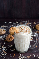 Anjeer milk shake or dried fig milk shake with almonds - selective focus
