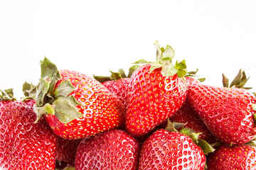 Strawberry isolated on white background. Red berries in a tray on a white background.