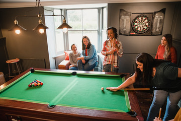Friends Playing Pool