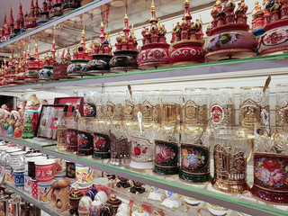 MOSCOW, RUSSIA - DECEMBER 30, 2019:A variety of Russian souvenirs with different images, are sold...