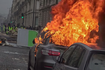 Abstract, blur, bokeh background, defocusing - image for the background. Street riots in Paris,...