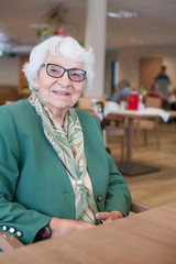 Senior woman at rest home