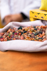 Nuts and other dried ingredients on a street market stand in Marrakesh, Morocco