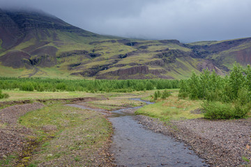 Small mountain river near Hoffell and Bjarnanes area in Iceland