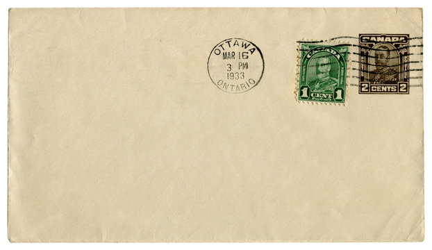 Ottawa, Ontario, Canada  - 16 March 1933: canadian historical envelope: cover with brown imprinted stamp, two cents and green stamp one cent, George V profile, king of  Great Britain, postal cancellat