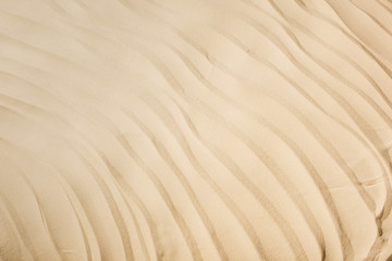 top view of background with textured sand and copy space