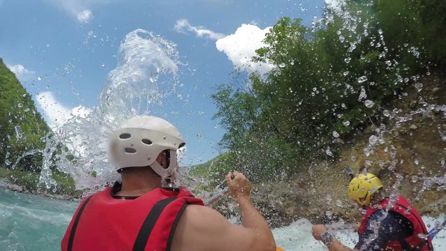 People in boat enjoy on whitewater rafting trip on Tara river in Montenegro