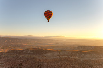 Hot Air Balloons Flying Over Cappadocia Turkey at sunrise