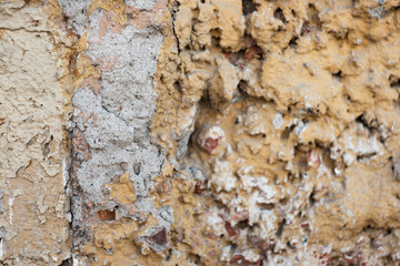 Concrete on the wall painted with yellow paint