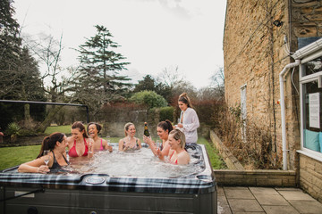 Friends Relaxing in a Hot Tub