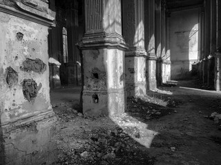 Burnt abandoned interior of an old catholic church in Ukraine