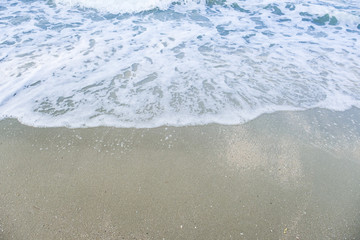 sea wave  on sand beach.