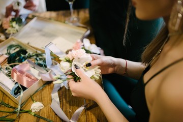 Florist's table with flowers. Florist makes flowers