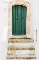 Italy, Ostuni, characteristic front door in the ancient historic center.