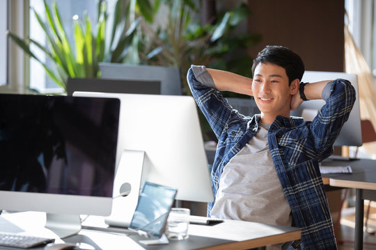 Young College Student Using Computer