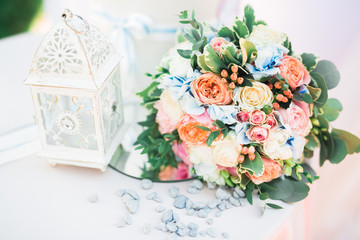 Beautiful wedding bouquet with different flowers, roses