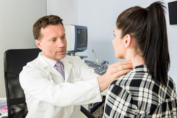 Young woman getting thyroid gland control-health care and medical concept