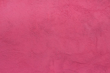 background wall with putty painted pink texture surface