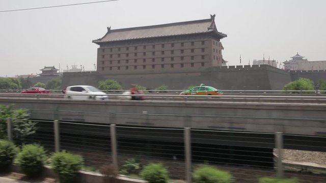 View of Xi'an city wall form moving train ,xi'an, shaanxi, china