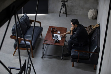 Photographer working in studio